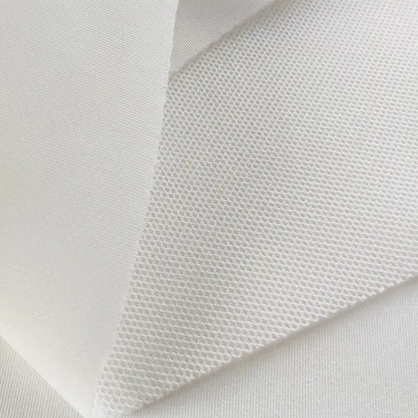Mesh Fabric ဆိုတာ ဘာလဲ အားကစားဝတ်စုံမှာ ဘာကြောင့် အရမ်းအရေးကြီးတာလဲ။
